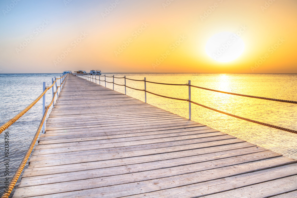 Obraz premium Pier on Red Sea in Hurghada at sunrise, Egypt
