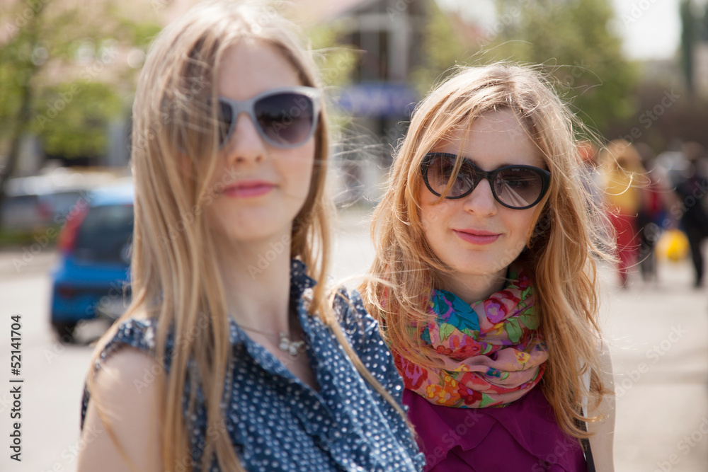 Two girls in a city Two girls in a city