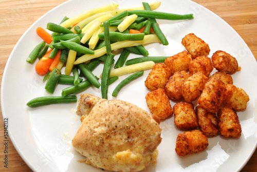 Baked Chicken Dinner with Beans and Potato Tots photo