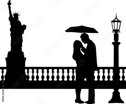 Romantic couple in New York under umbrella silhouette