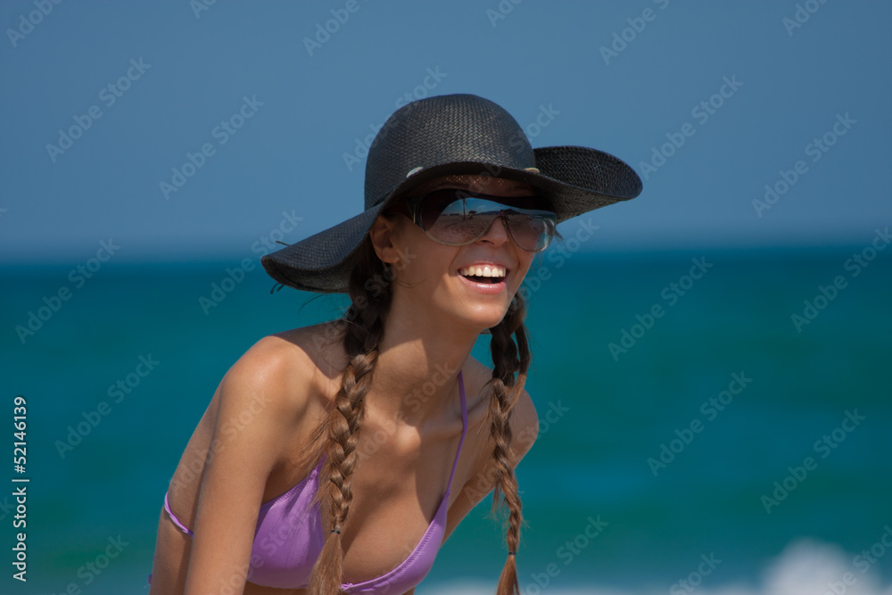 Young Woman On The Beach