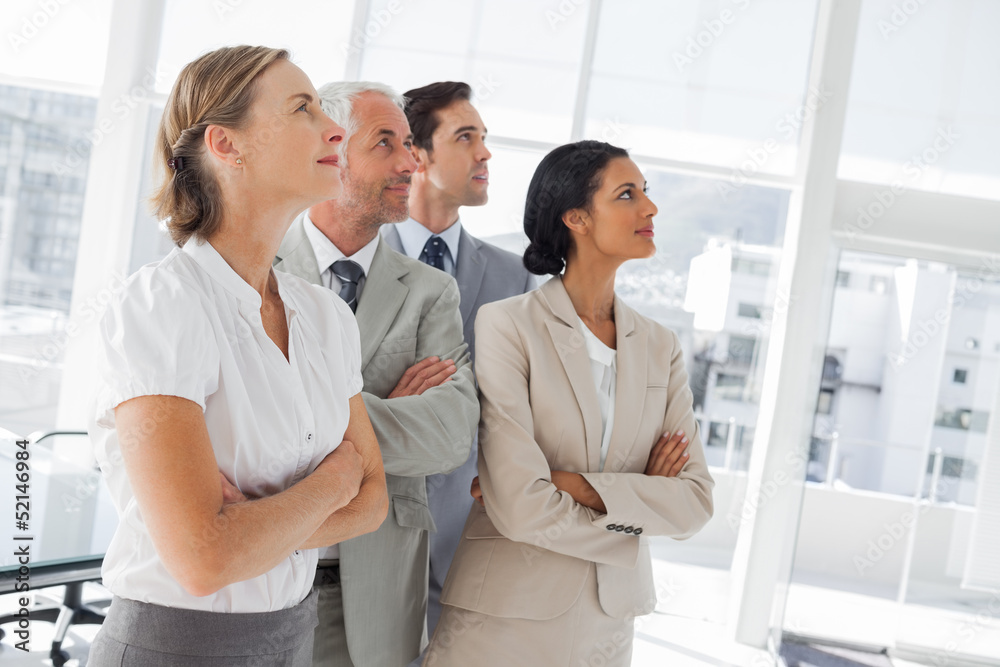 Confident business people looking at the same way Confident business people looking at the same way
