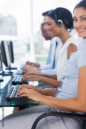 Cheerful agent working on call centre