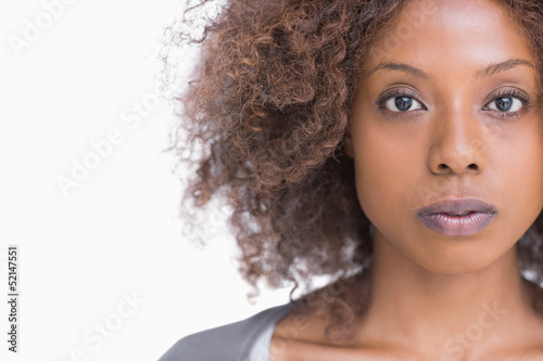 Unsmiling woman looking at camera