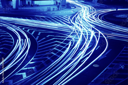 Photography the light trails on the modern building background in shanghai china