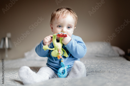 baby playing with a toy