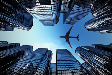 Business towers with a airplane silhouette
