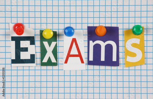 The word Exams in magazine letters on graph paper