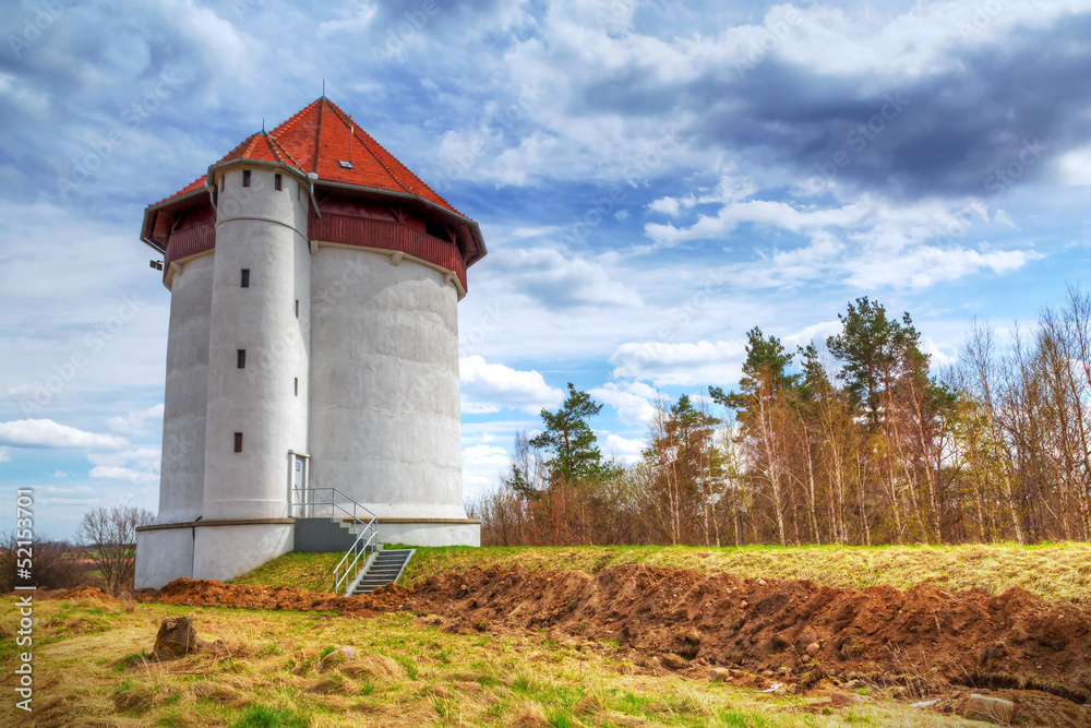 White tower of hydroelectricity in Bielkowo, Poland