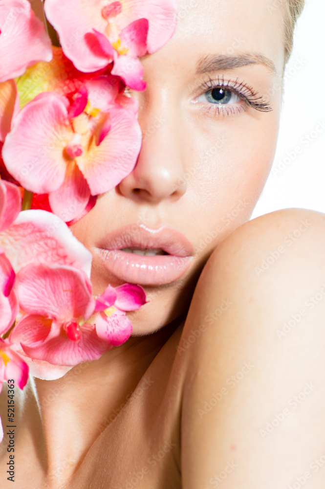 Beautiful girl face & pink flowers, perfect skin Beautiful girl face & pink flowers, perfect skin