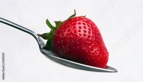 Red Raw Food Fruit Strawberry on a Silver Spoon