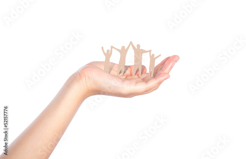 Hand with paper cut of family isolated on background