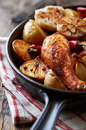 Oven-baked chicken with vegetables 