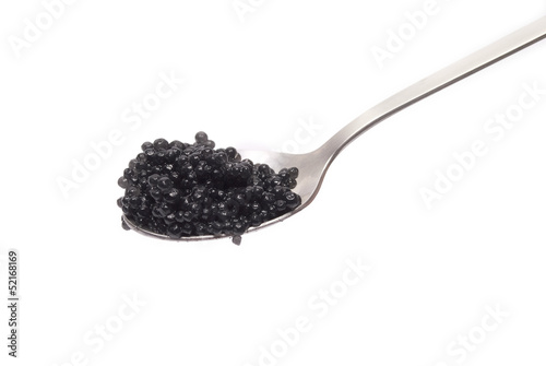 Caviar on spoon isolated on white