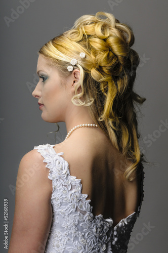 Young bride showing her neck