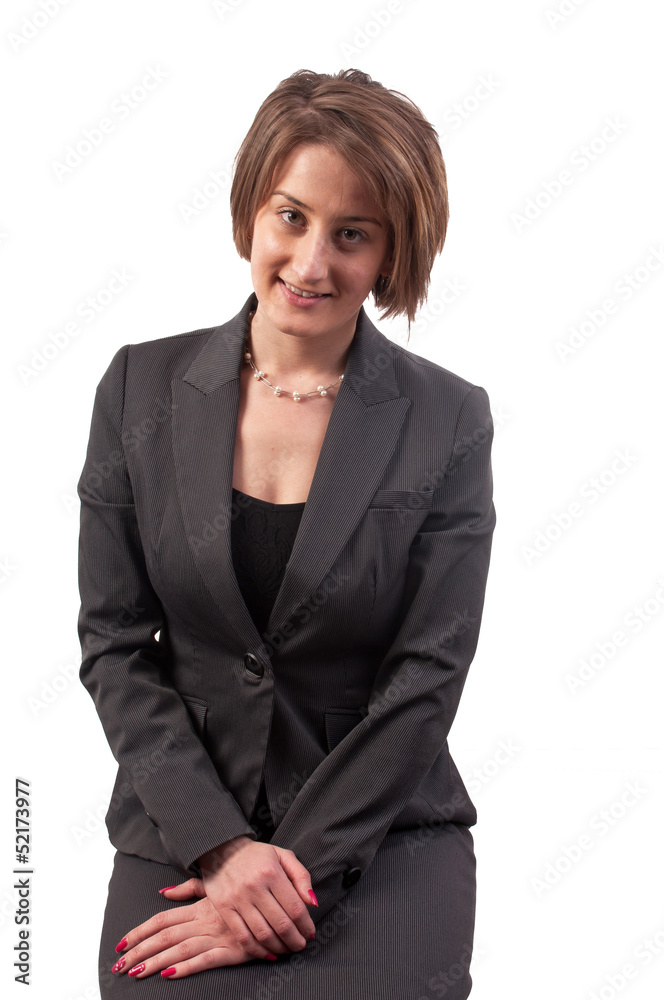 Portrait of a pretty successful business woman smiling and looki Portrait of a pretty successful business woman smiling and looki
