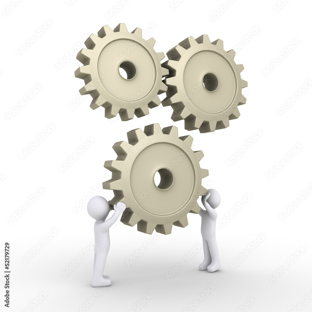 Two persons attach cogwheel Two persons attach cogwheel