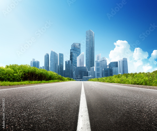 Fototapeta Naklejka Na Ścianę i Meble -  Asphalt road and modern city