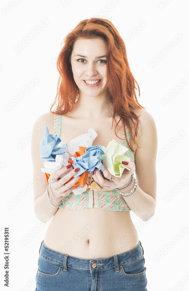 Smiling young woman recycling paper Smiling young woman recycling paper