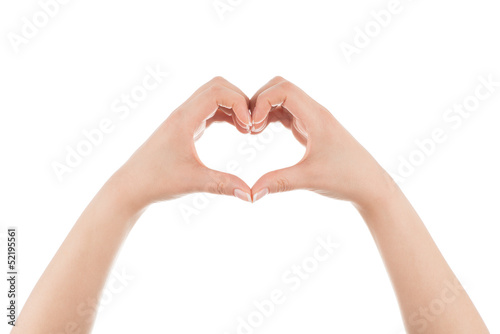 Heart shape made of two woman s hands.