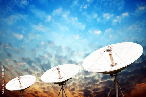 satellite dish antennas under sky