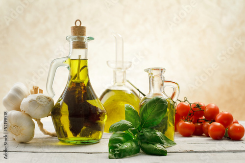 Fototapeta Naklejka Na Ścianę i Meble -  flavored  olive olis with genuine ingredients