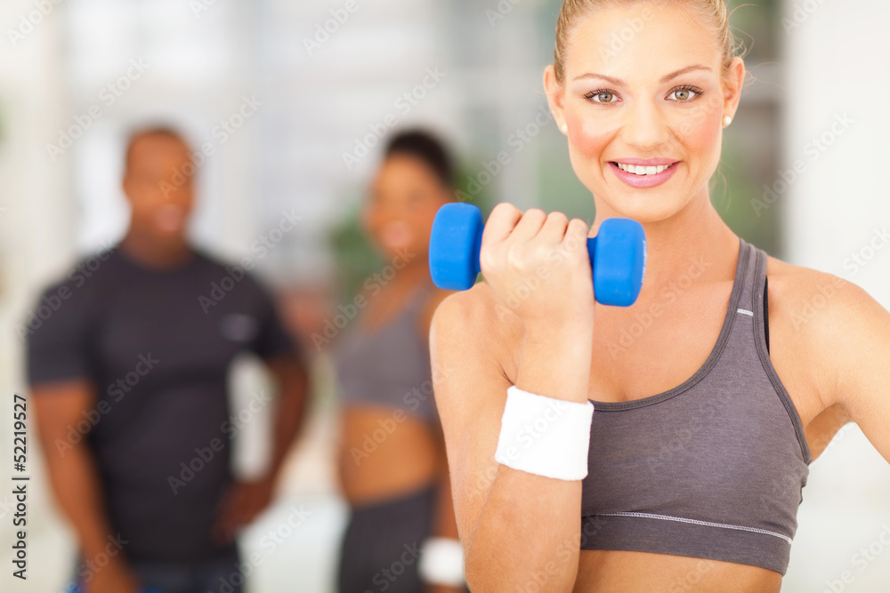 fit woman working out with dumbbell fit woman working out with dumbbell