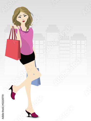 Fashionable, shopping girl with bags.