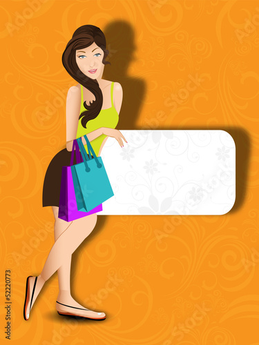 Fashionable, shopping girl with bags on yellow background with s