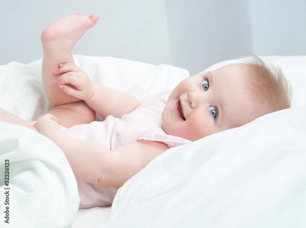 baby playing with his feet baby playing with his feet