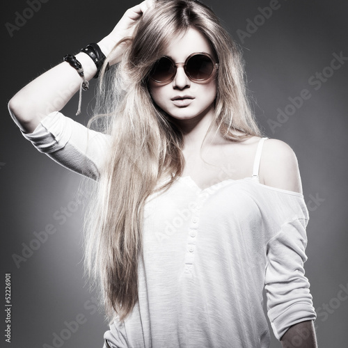 beautiful girl is in fashion style on  grey  background