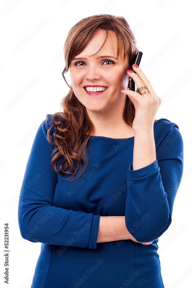 Pretty young lady speaking on the phone and smiling Pretty young lady speaking on the phone and smiling