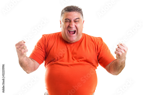Excited  man celebrating success with hands raised