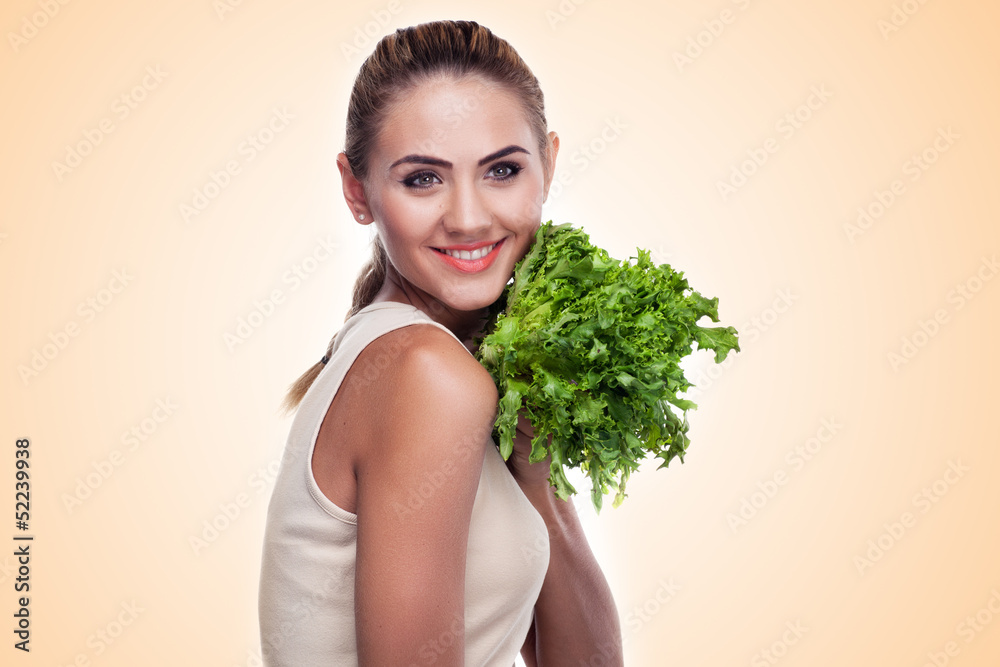 woman with bundle herbs (salad). Concept vegetarian dieting - he woman with bundle herbs (salad). Concept vegetarian dieting - he