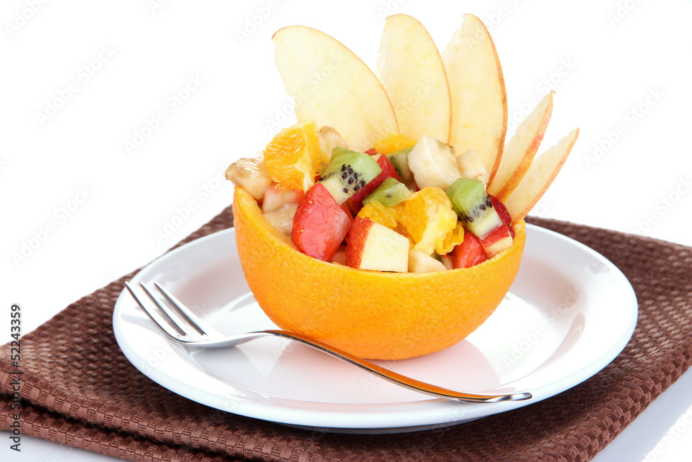 Fruit salad in hollowed-out orange isolated on white Fruit salad in hollowed-out orange isolated on white