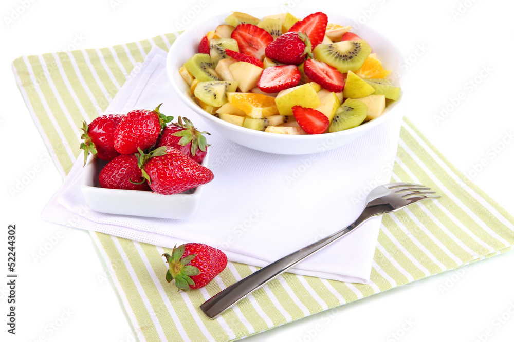 Useful fruit salad of fresh fruits and berries in bowl isolated Useful fruit salad of fresh fruits and berries in bowl isolated