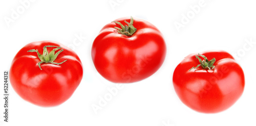 Ripe tomatoes isolated on white.