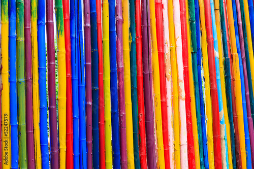 Abstract texture of dyed bamboo sticks.