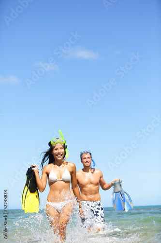 Travel beach vacation people - happy couple fun