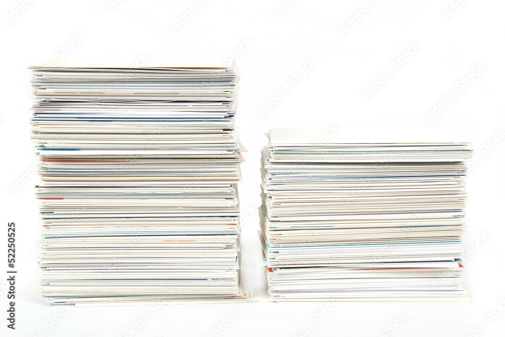 stack of business cards on the table isolated on white stack of business cards on the table isolated on white