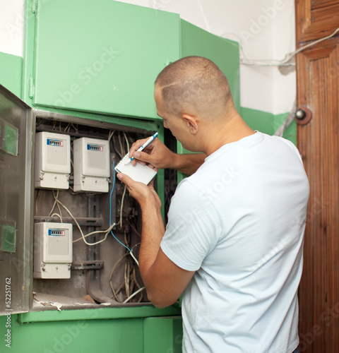 Man rewrites electric meter readings photo