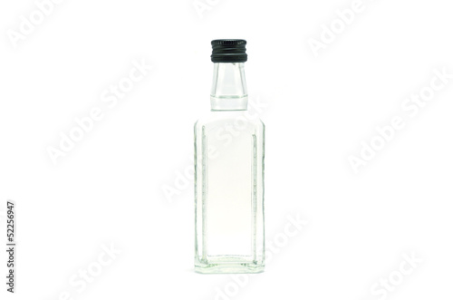 a glass bottle filled with liquid
