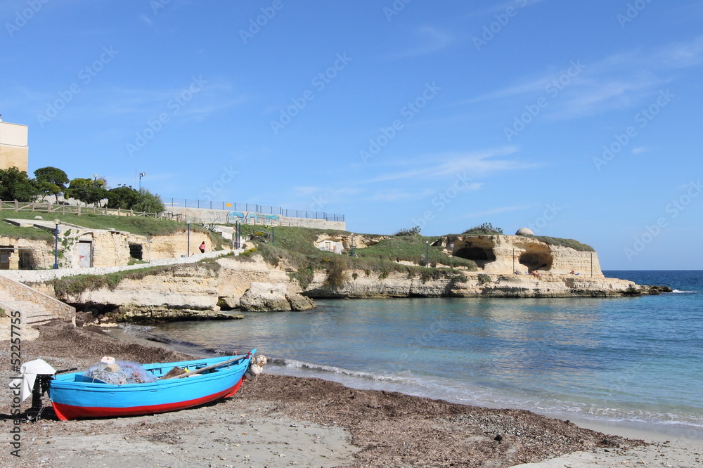 boat and beach in Salento Peninsular of Apulia, Italy