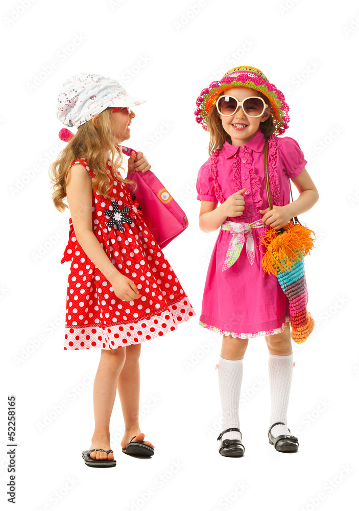 Two girls are dressed for summer