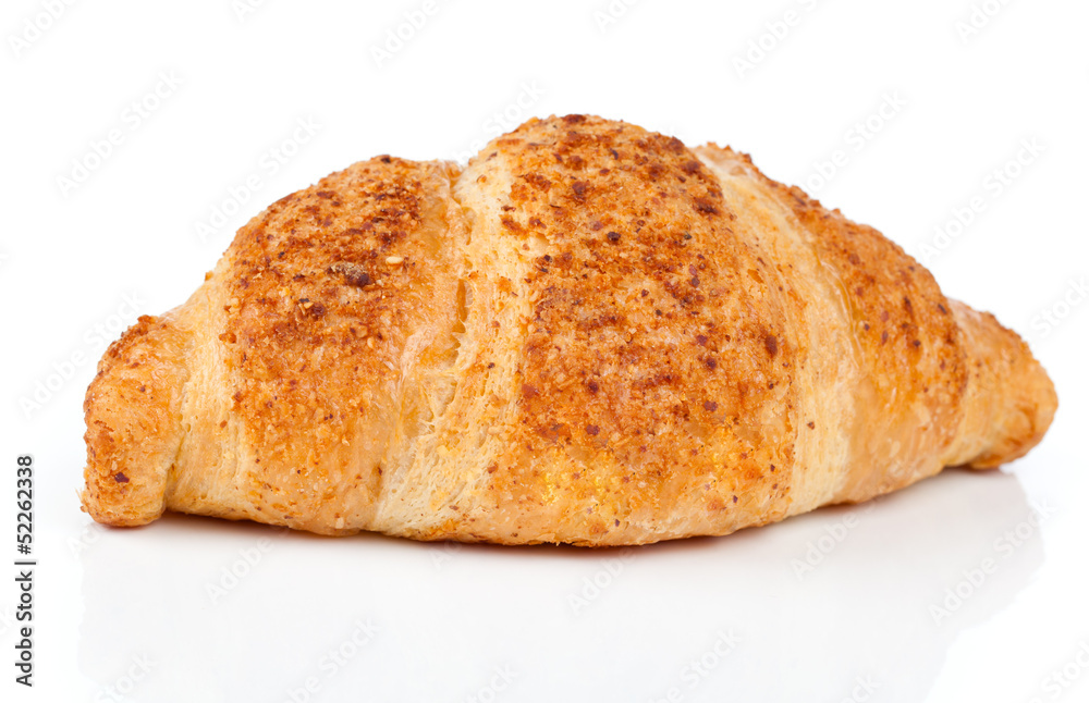 Fresh and tasty croissant with nut cream over white background
