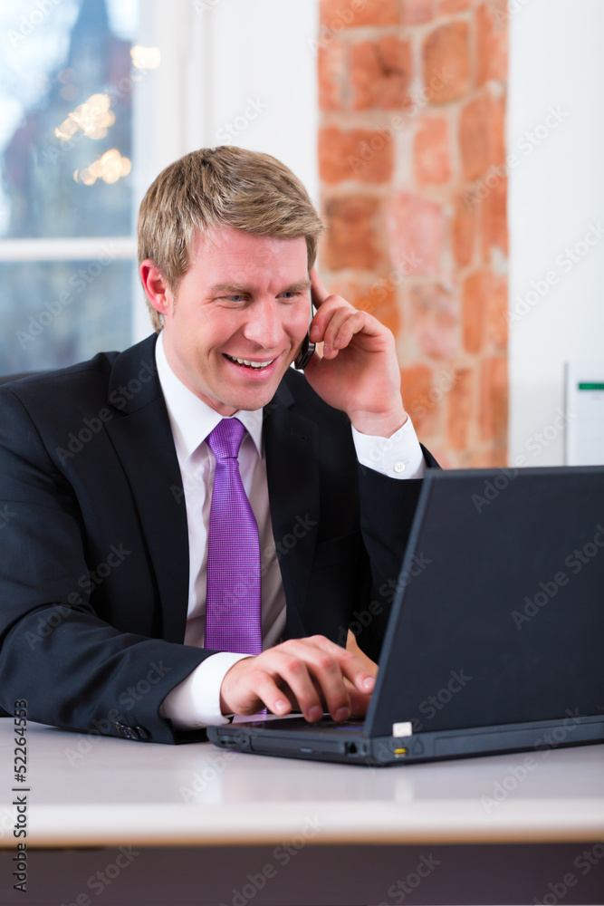 Lawyer in office sitting on the computer Lawyer in office sitting on the computer