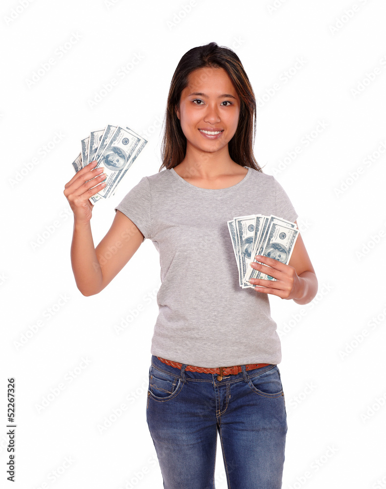 Smiling ethnic young woman with cash dollars Smiling ethnic young woman with cash dollars