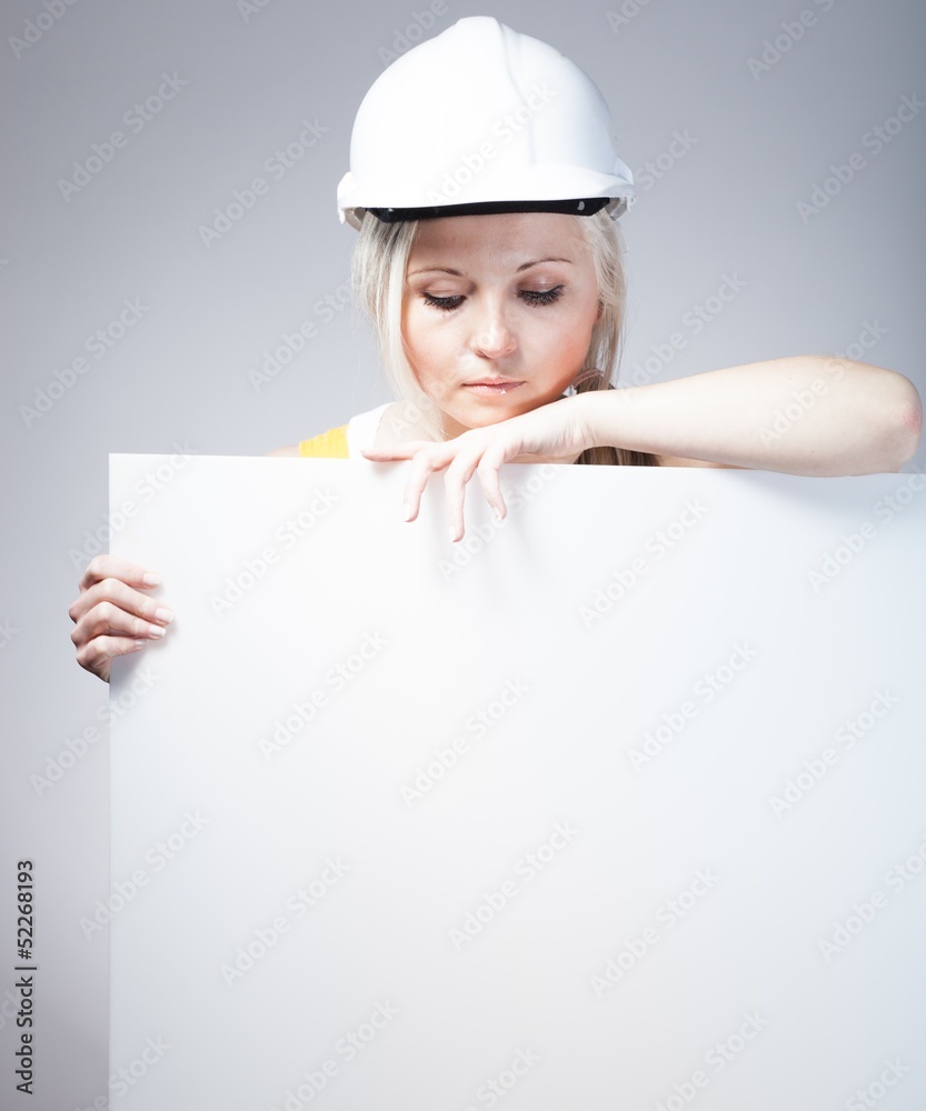 Young builder woman construction worker, empty frame Young builder woman construction worker, empty frame