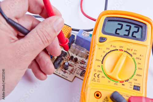 Testing board with digital multimeter