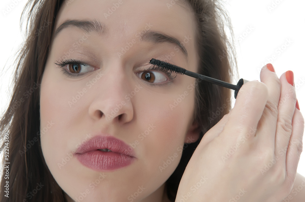 Frau mit Wimperntusche Frau mit Wimperntusche